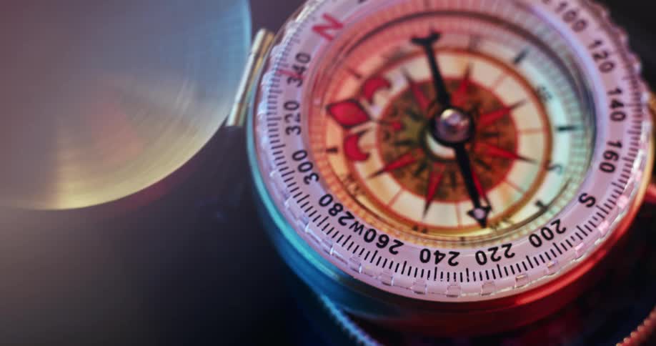 Compass needle rotates back and forth along 360 degrees