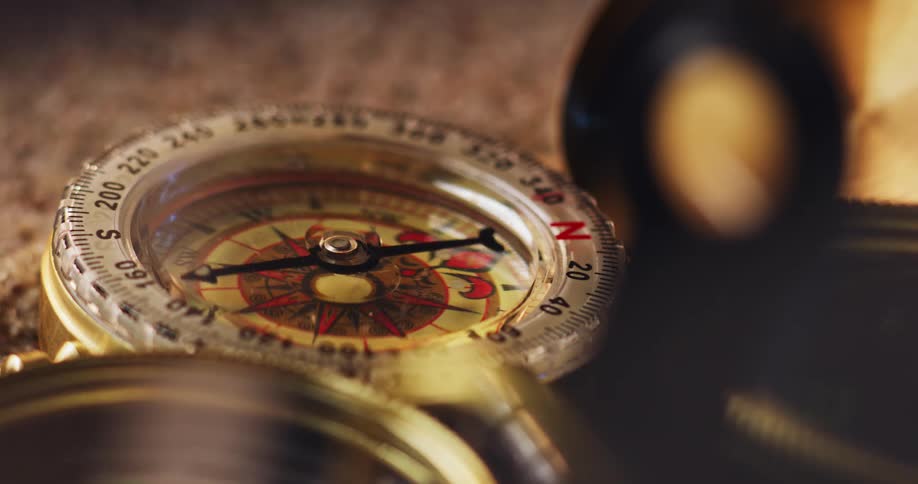 The needle on a compass spins around and around