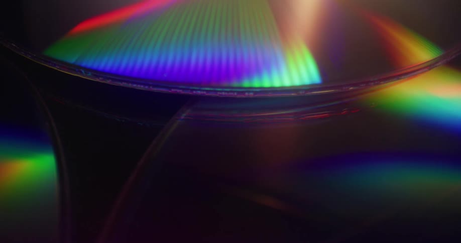 The cds spin under the light