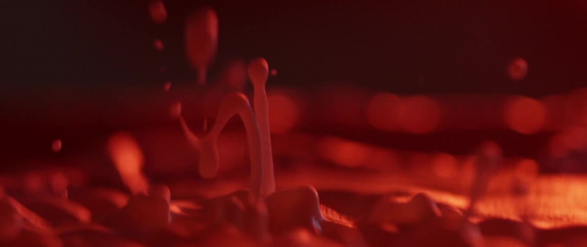 Red liquid bounces and vibrates