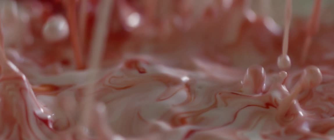 White and red liquid bounces around