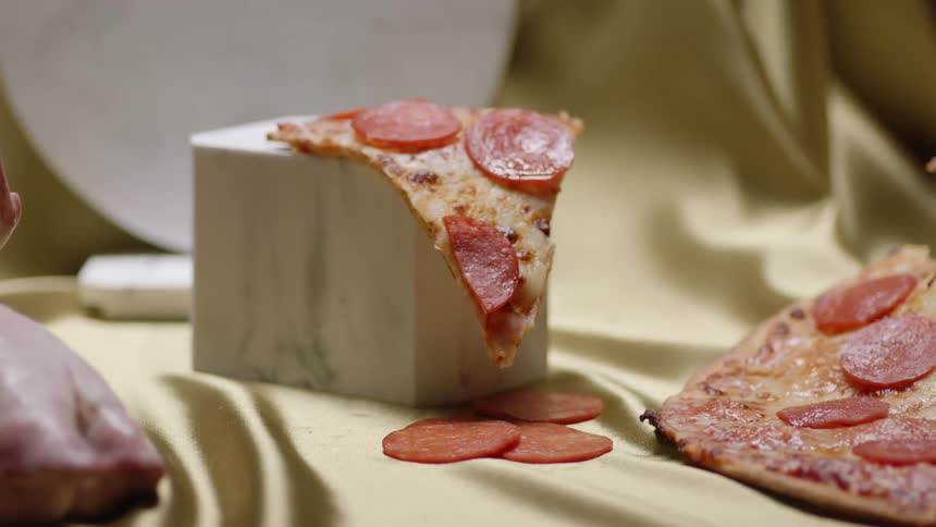 Pizza set up for a photo shoot in a studio