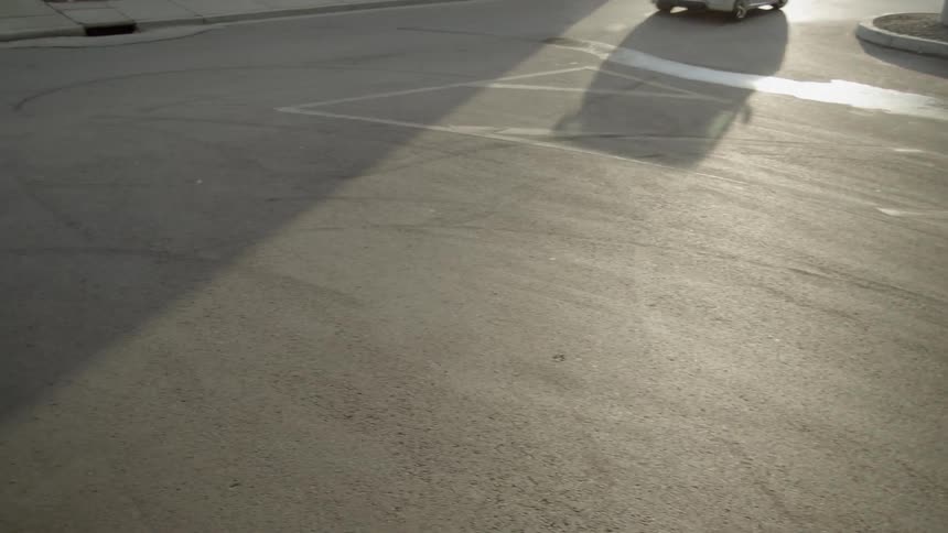 A car makes a sharp turn on a street