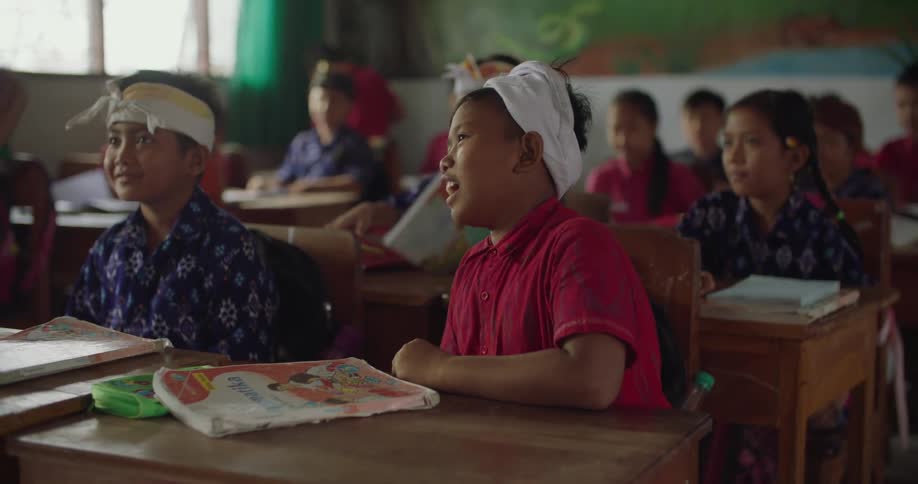 Young kids are at school in the middle of the day time