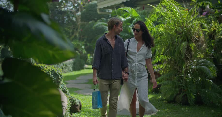 A couple walk down the path together