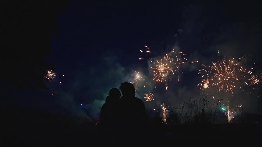 People watch the fireworks display
