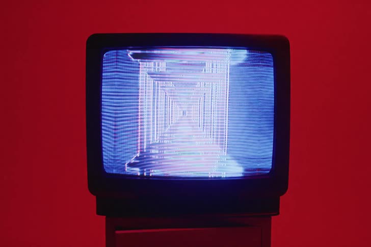 A small television is displaying some curious geometric shapes on its screen