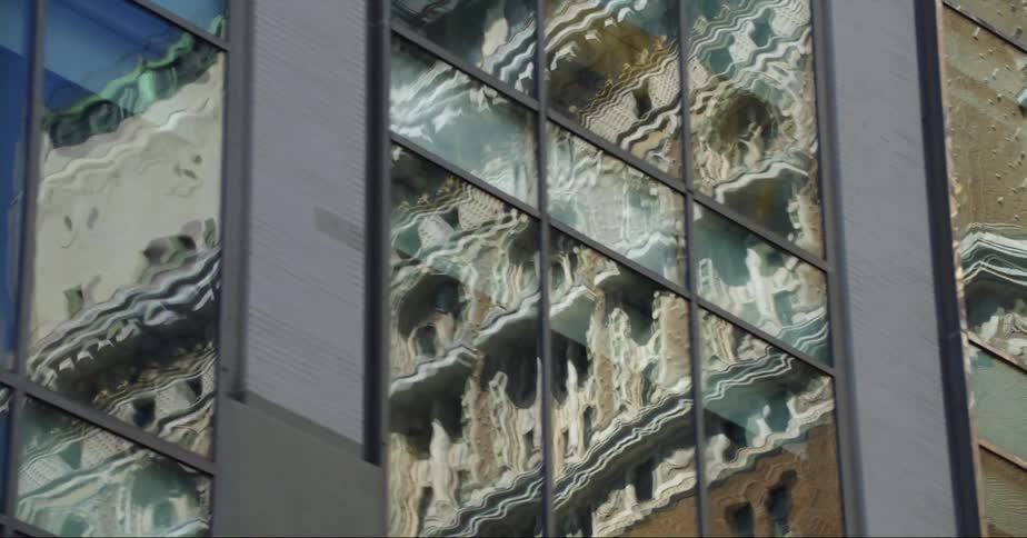 Close up view of a building in a downtown city is displayed