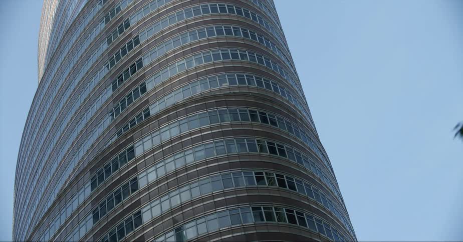 Exterior view of office building against the blue sky in the city