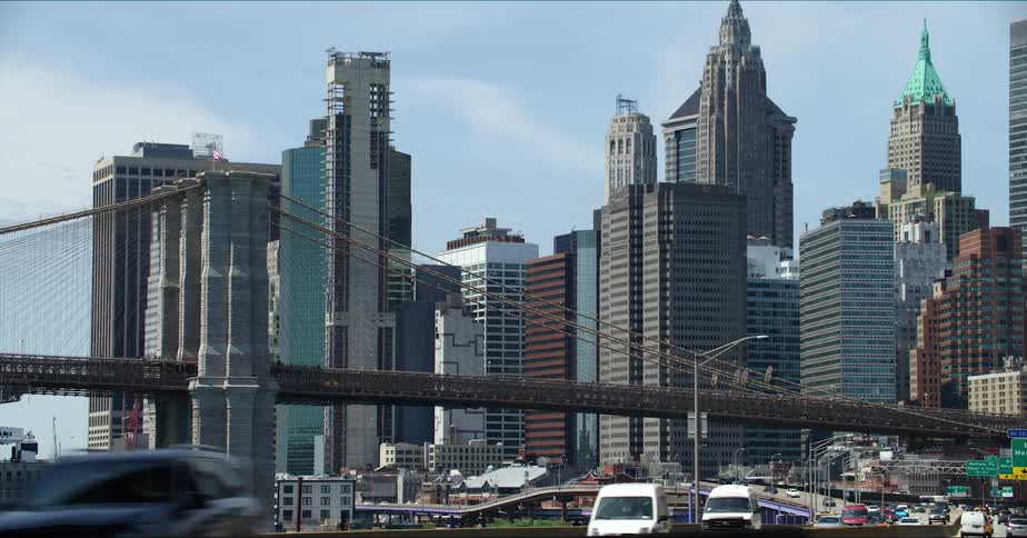 Traffic moves on the freeway through the city