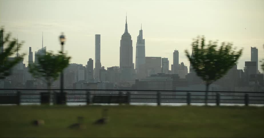 Distant view of skyscraper with high rise buildings in the city
