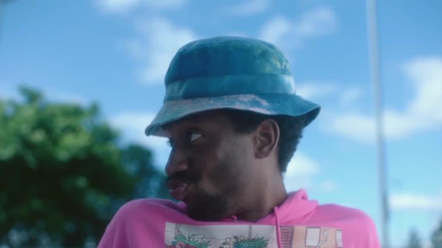 A man turns his head to the side