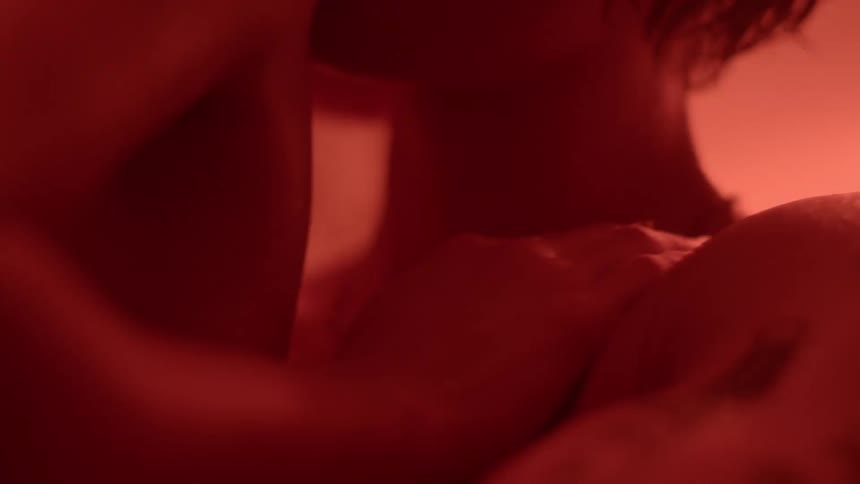 A couple are hugging inside