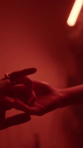 Close up of two peoples hands holding