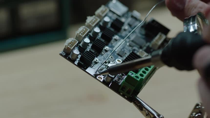 A soldering iron is used on repairing and building a circuit board