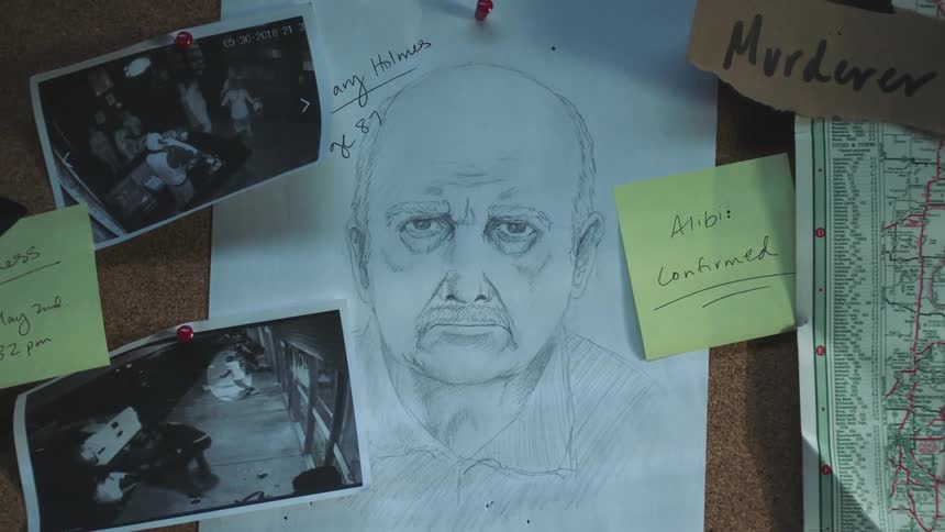 A sketch of a man and photographs are pinned to a bulletin board with a note saying murderer