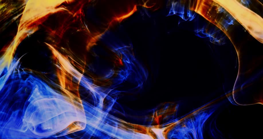 Blue and gold paint combine against a black background