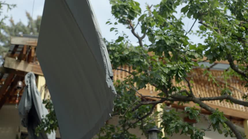 Laundry dries on an outdoor clothing line