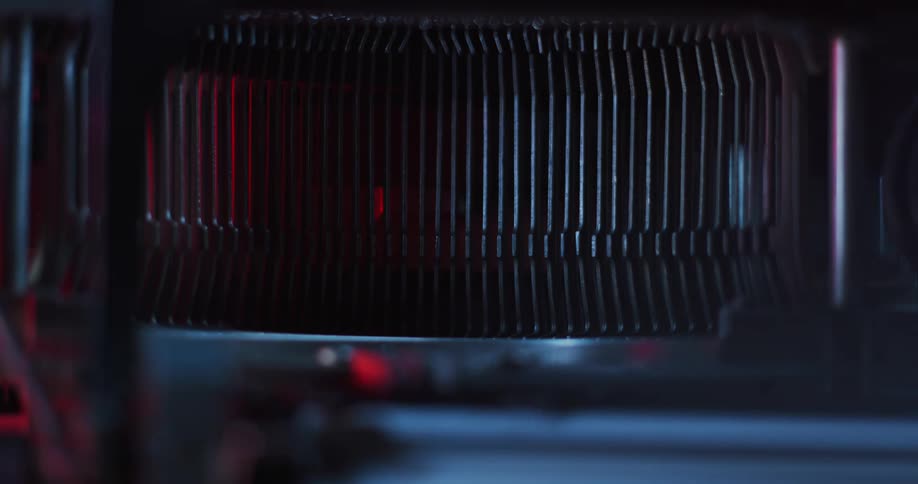 Light shines on the type bars of an old typewriter