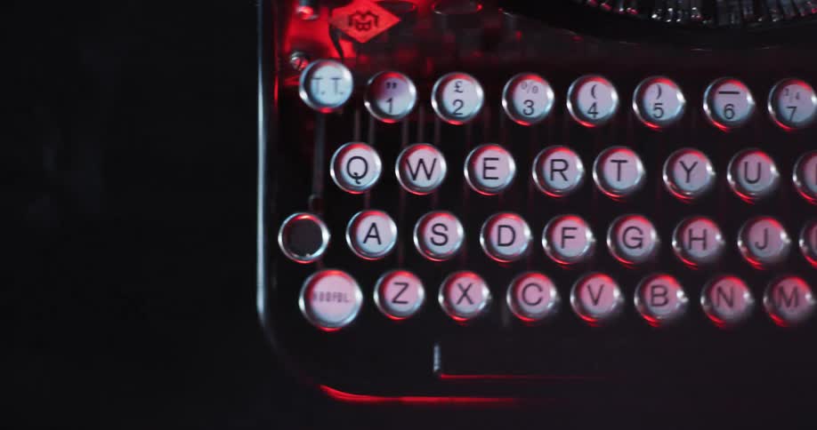 Light shines on the keys of an old typewriter