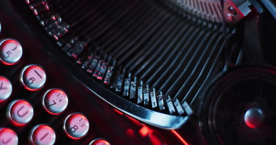 Light moves across an antique typewriter