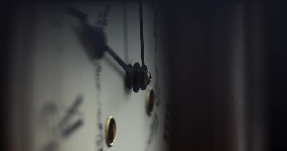Close up of analog clock with hour hand and minute hand