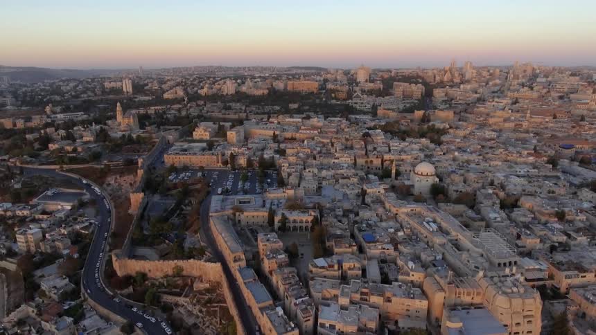 A dense city at sunset