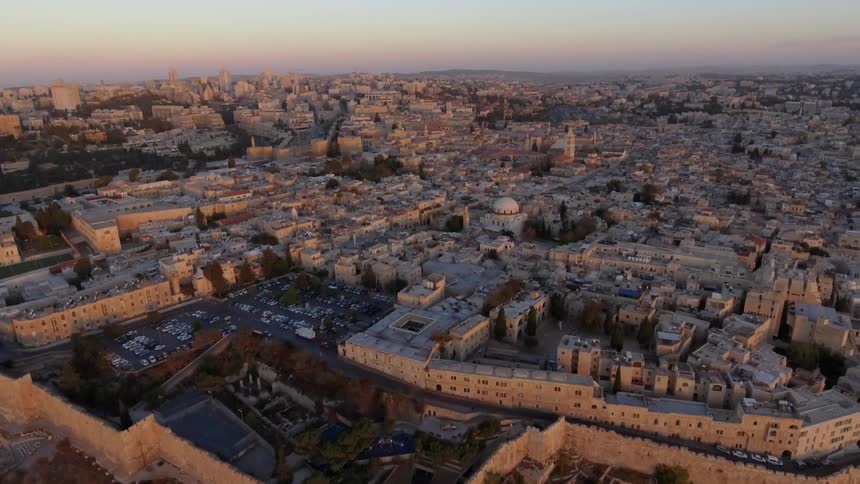 Aerial view of a city at sunset