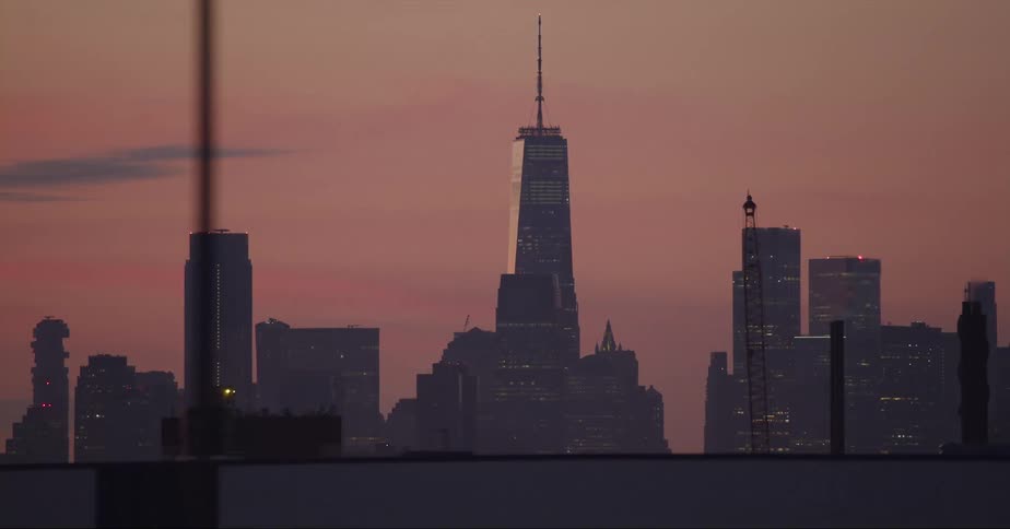 One world trade center in new york city at sunset seen from a moving vehicle