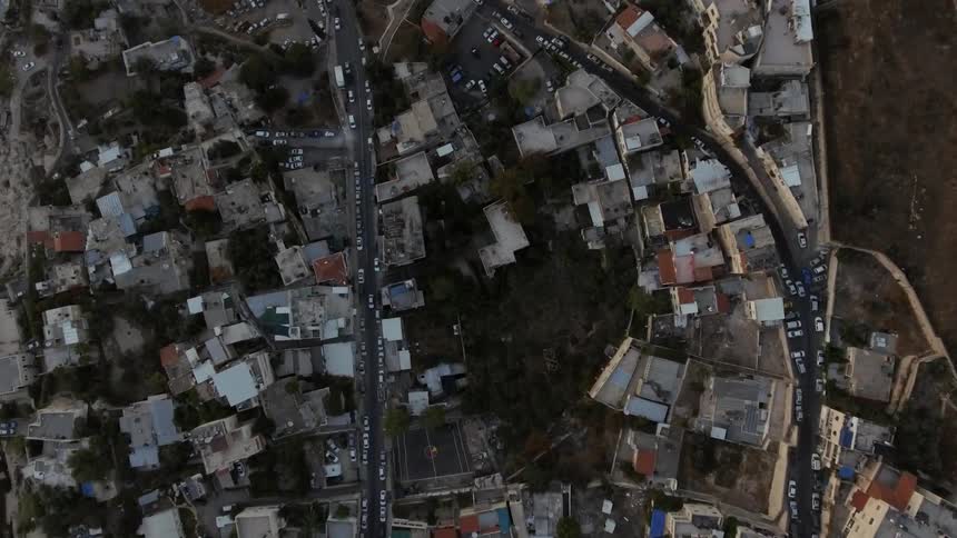 Traffic and roads winding through a city