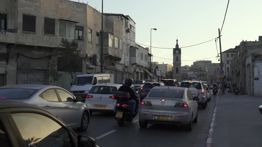 A motorcycle winds through traffic