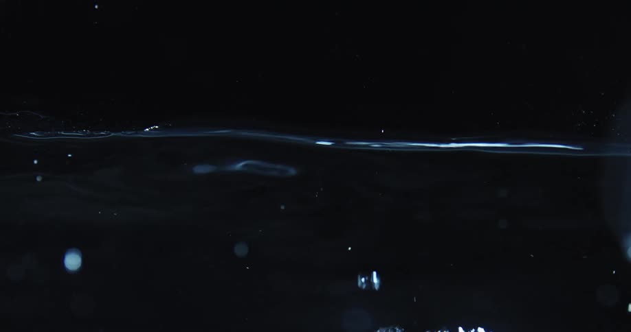 Water bubbles up to the top and ripples across the surface