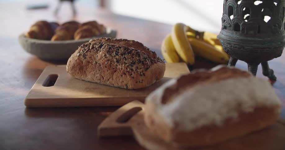 A view of bread and fruit on a table