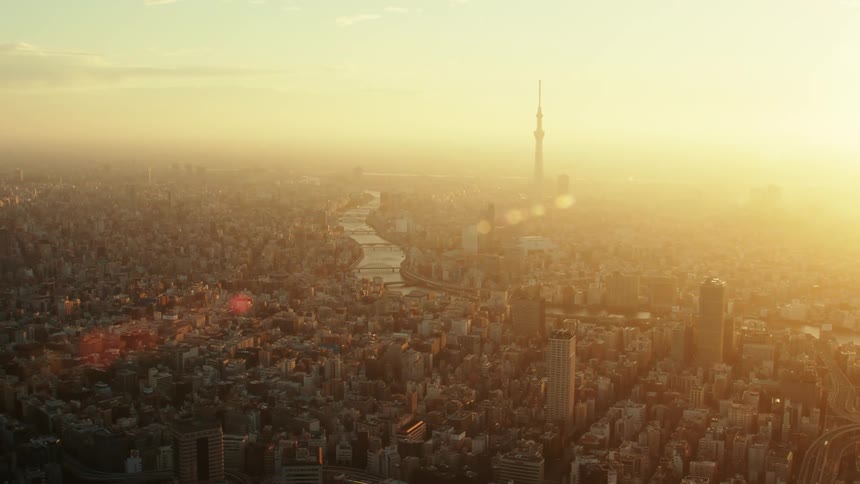An aerial view of a city with tall towers