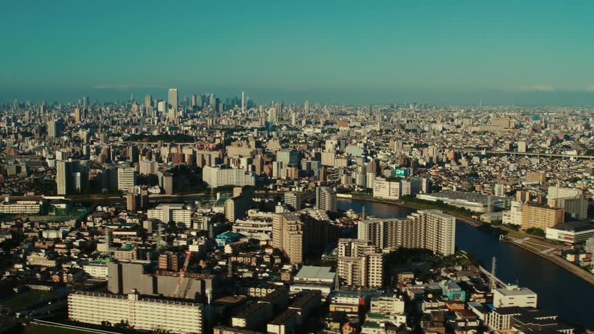 An aerial view of buildings and skyscrapers in a city