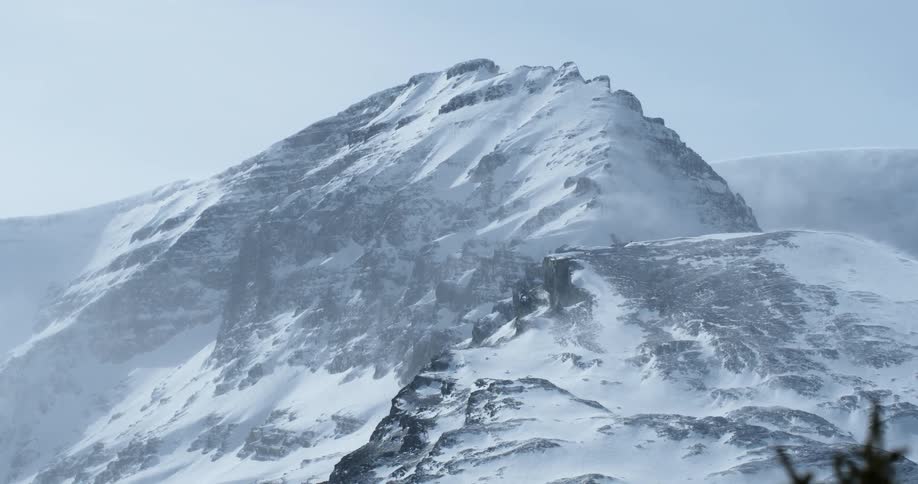 A snow covered mountain in the distance