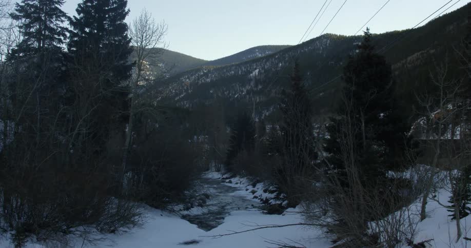 A river through a mountain forest