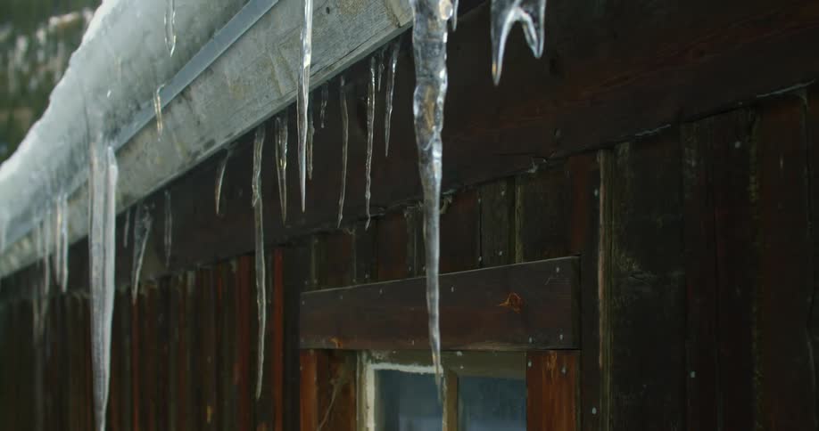 Icicles hang from a rooftop