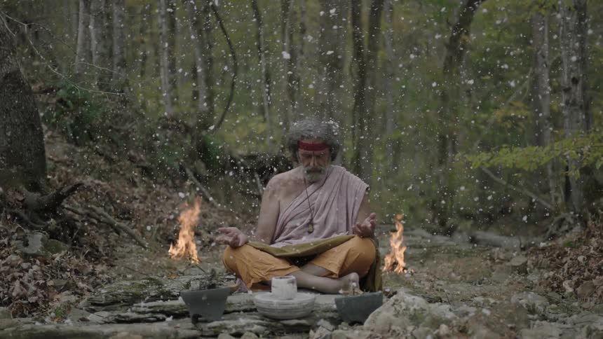 A man sits in the snow