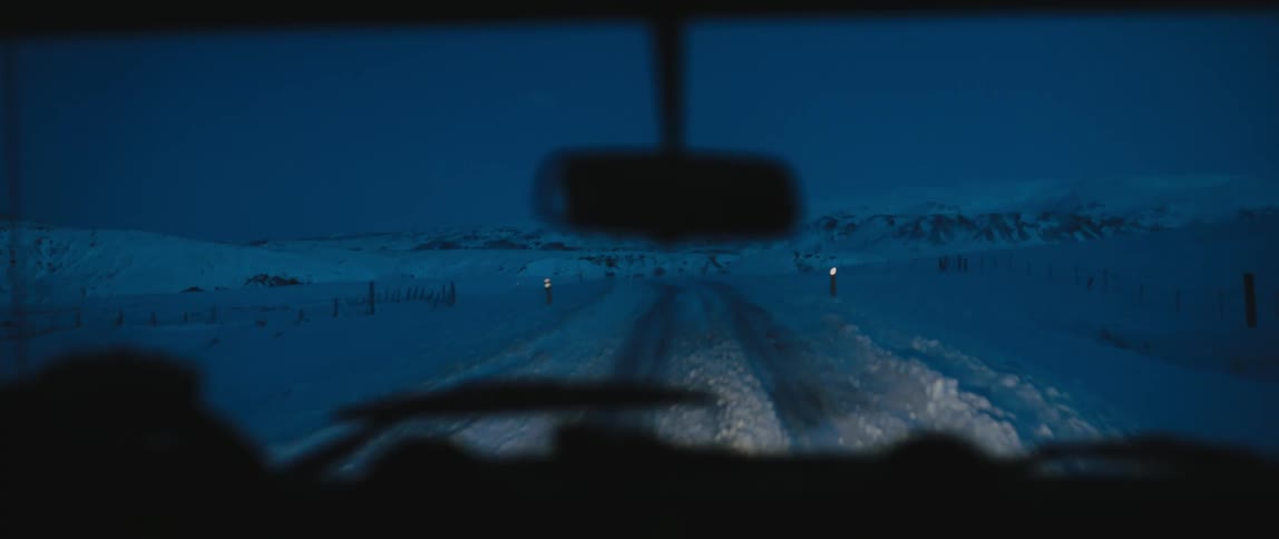 The vehicle is traveling on the ice covered roads