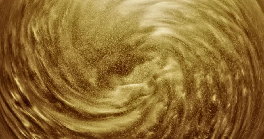 Mixture of golden particles spin and form ripples and waves