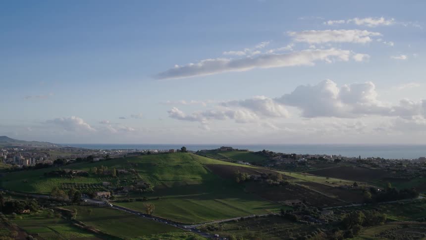 Green hills cover this valley