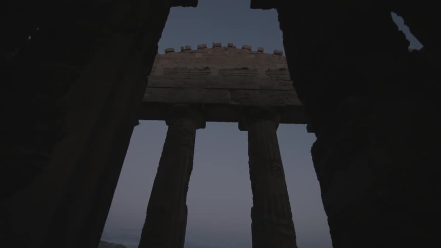Stone pillars tower overhead