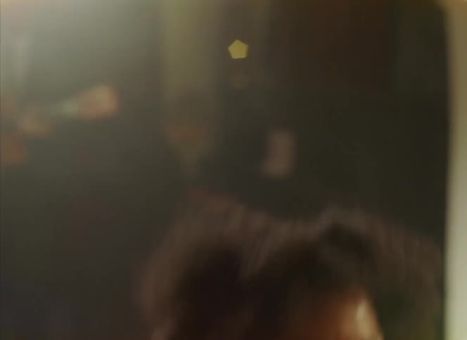 A woman dancing indoors