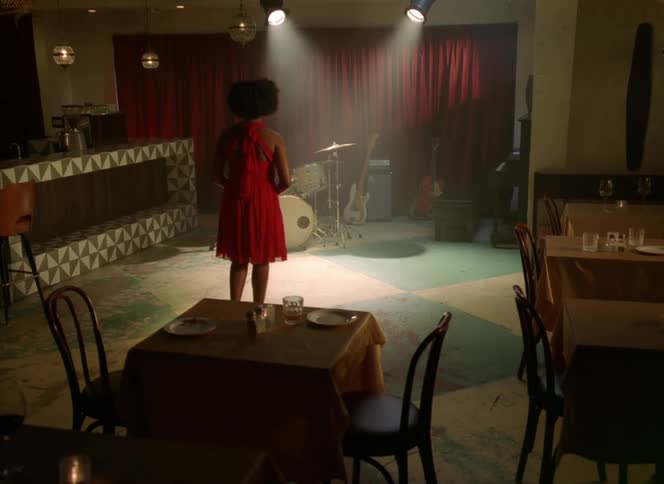 Female walking into room