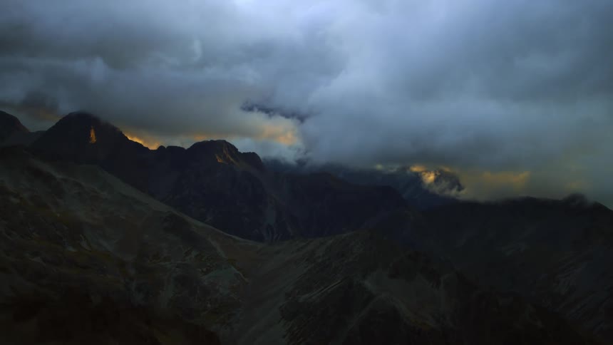 Aerial view of clouds covering the mountain tops