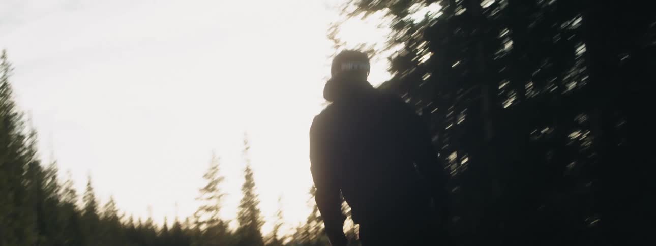 A man snowboarding down a mountain