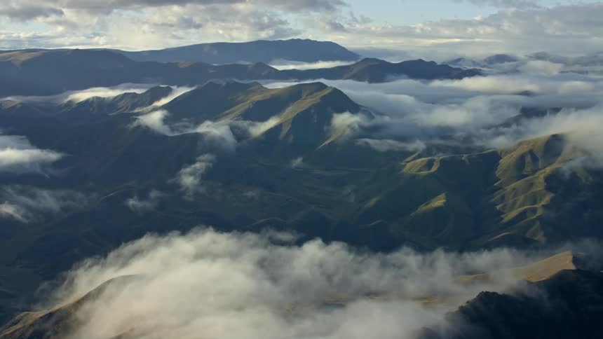 Aerial view of mountains are displayed during midday