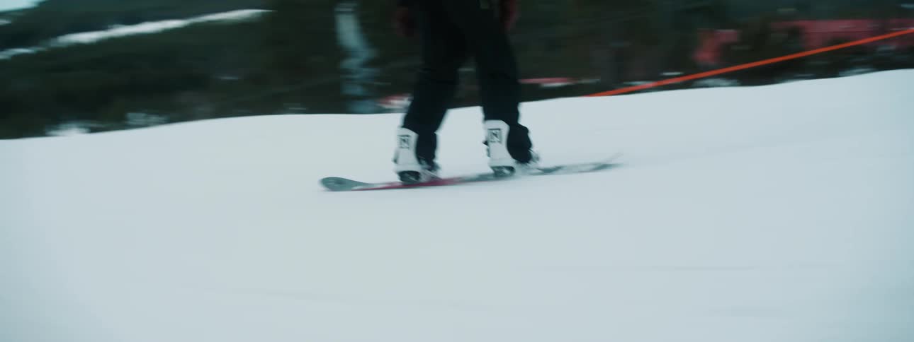 A person snowboarding down a mountain
