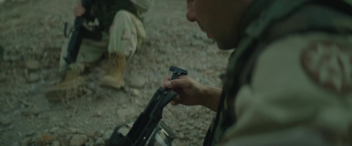 The soldier is assembling a rifle